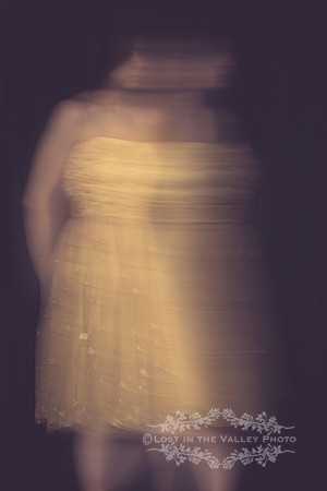 Blurred Image of a Woman Wearing a Yellow Dress