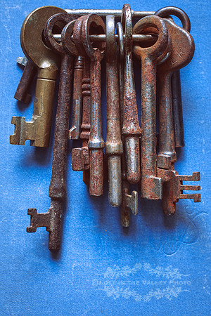 Rusting Keys on a Blue Background
