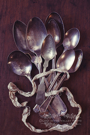 Silver Spoons with White Lace