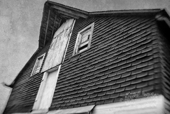 black and white architecture photograph of an old New England barn