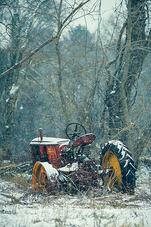 rustic landscape photography of a rusty tractor in New England